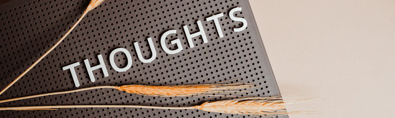 The Word Thoughts on a Pin Board